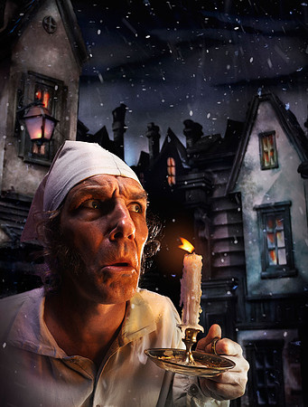Ebenezer Scrooge by candlelight